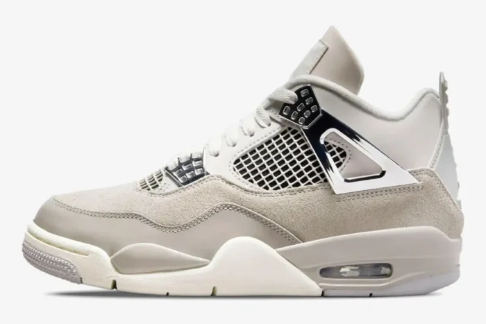 Side profile of the women's Air Jordan 4 Retro Frozen Moments sneaker in light grey and metallic silver. - SKU AQ9129-001
