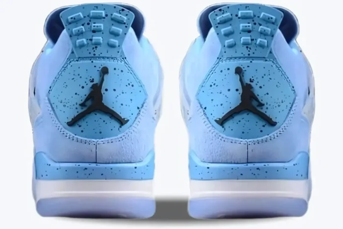 Rear view of light blue Air Jordan 4 Retro UNC Player Exclusive sneakers with black speckled heel tabs. - SKU su18-mnjdls-731-lnm-aj4-904284