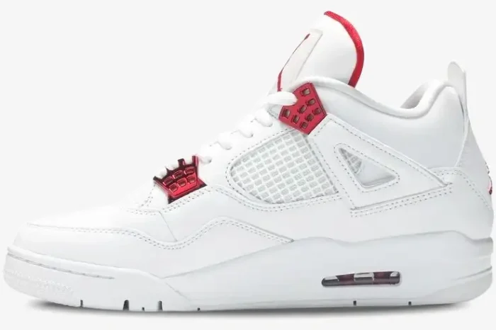Side view of the white Air Jordan 4 Retro Red Metallic sneaker with shiny red eyelets and accents. - SKU CT8527-112