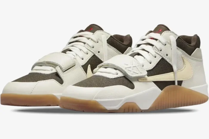 Air Jordan Jumpman Jack TR x Travis Scott Sail sneakers featuring a reverse swoosh in a three-quarter front view. - SKU FZ8117-100
