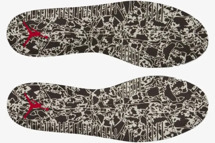 Top-down view of the black and white graphic insoles with red Jumpman logos for the Jordan Jumpman Jack TR Travis Scott. - SKU FZ8117-100