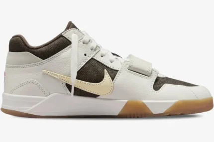 Side profile of Air Jordan Jumpman Jack TR x Travis Scott Sail sneaker with reverse swoosh and gum sole. - SKU FZ8117-100