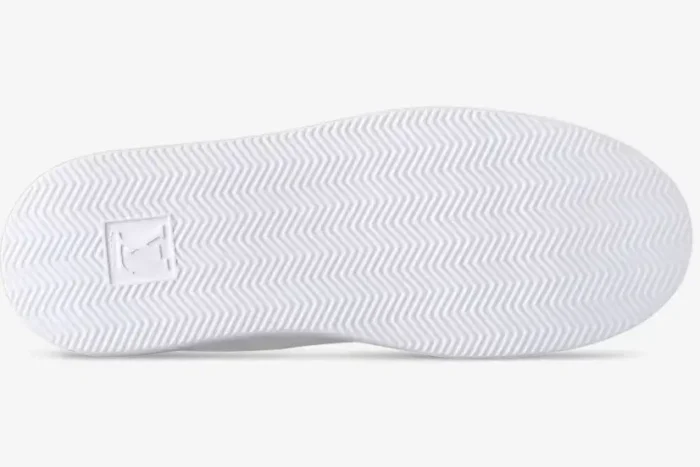 Bottom view of a white Louis Vuitton Beverly Hills leather sneaker sole with herringbone tread pattern. - SKU 1AHQY3