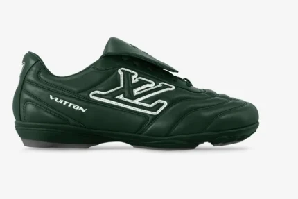 Side profile of a dark green Louis Vuitton Footprint soccer shoe from the LV+VERS UNITED Edition.