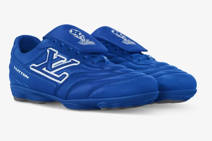 Louis Vuitton Footprint Soccer Shoes in blue, front three-quarter view.