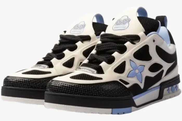 Louis Vuitton LV Skate sneakers in black, white, and blue, shown from a three-quarter front angle. - SKU LV1SKT1