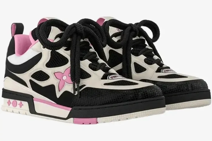 Louis Vuitton LV Skate sneakers in black, white, and pink, shown from a three-quarter side angle. - SKU 1ADE1K