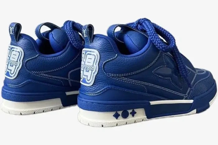 Rear view of blue and white Louis Vuitton LV Skate Sneakers featuring thick rope laces and white stitching. - SKU 1ACQMN