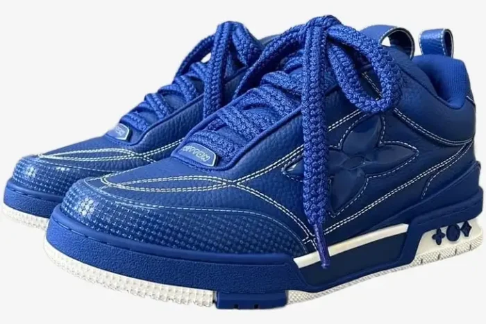 Louis Vuitton LV Skate Sneaker in blue and white, three-quarter side view showing thick laces and monogram detail. - SKU 1ACQMN
