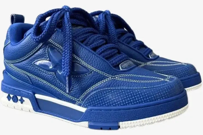 Blue Louis Vuitton LV Skate Sneakers with white contrast stitching, three-quarter side view. - SKU 1ACQMN