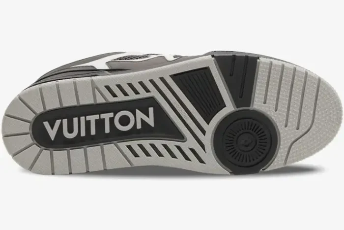 Outsole view of Louis Vuitton LV Skate Sneaker in grey, white, and black with Vuitton branding. - SKU 1AC52K