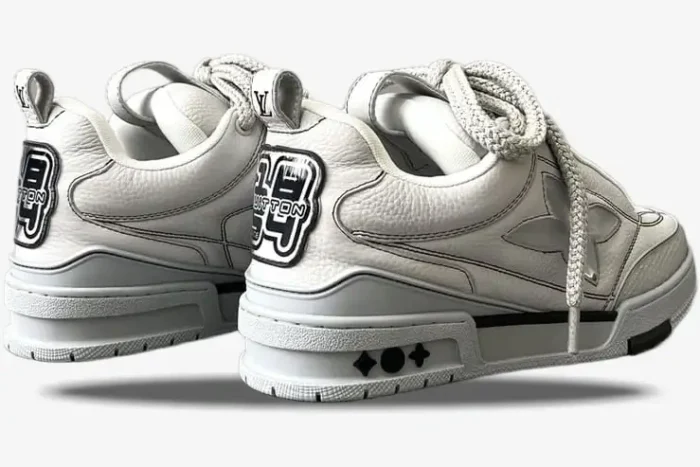 Rear view of Louis Vuitton LV Skate Sneakers in grey leather with chunky laces and 1854 heel patch. - SKU 1abz5x