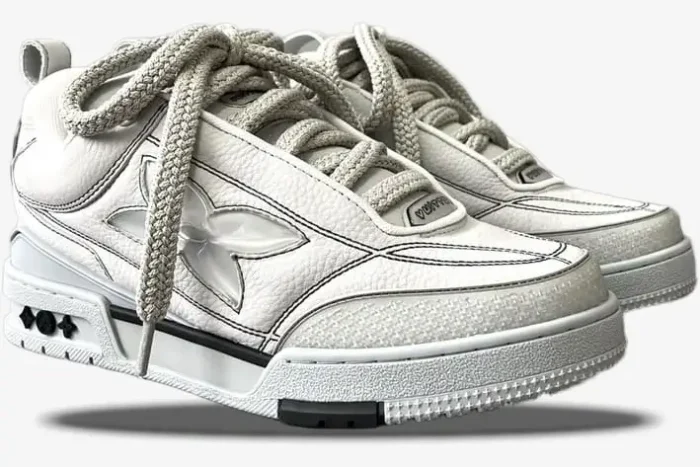 Side view of white and grey Louis Vuitton LV Skate Sneakers with thick rope laces and monogram flower detail. - SKU 1abz5x