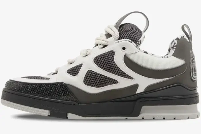 Louis Vuitton LV Skate Sneaker in grey, white, and black shown from a side profile perspective. - SKU 1AC52K