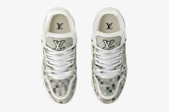 Top-down view of Louis Vuitton LV Trainer sneakers in beige damoflage camouflage pattern with white laces. - SKU 1AF6A6