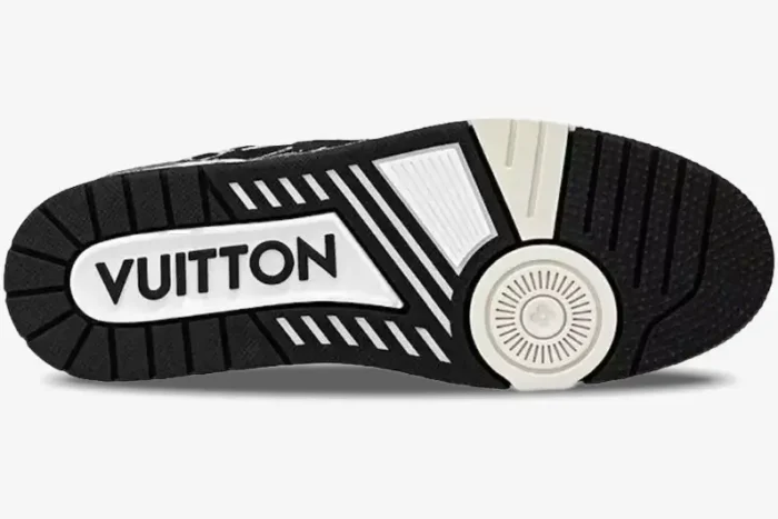 Bottom sole view of Louis Vuitton LV Trainer in black and white denim with VUITTON branding. - SKU 1A9JG9