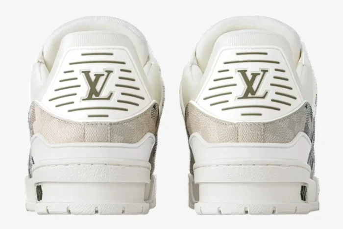 Rear view of Louis Vuitton LV Trainer sneakers in beige Damoflage camouflage with white soles. - SKU 1AF6A6
