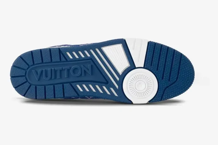 Bottom view of the blue and white outsole on a Louis Vuitton LV Trainer Monogram Denim sneaker. - SKU 1A9JGR