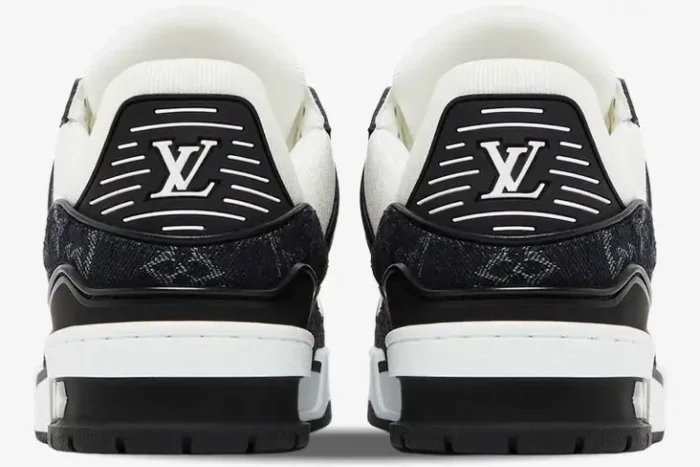 Rear view of Louis Vuitton LV Trainer sneakers in white and black monogram denim. - SKU 1A9JG9