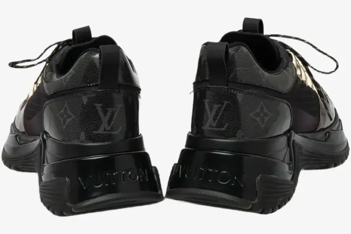 Rear view of Louis Vuitton Run Away Pulse sneakers in black monogram with embossed Vuitton logo on the heel. - SKU 1A40Z8