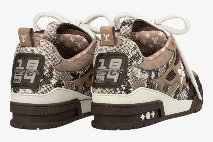 Rear view of Louis Vuitton Skate Sneakers in brown snakeskin and monogram with chunky laces.