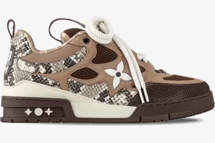 Side view of Louis Vuitton Skate Sneaker in brown snakeskin and monogram mesh with thick white laces.