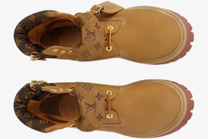 Top-down view of wheat Louis Vuitton x Timberland 6-inch ankle boots with monogram print and gold hardware. - SKU 1AD751