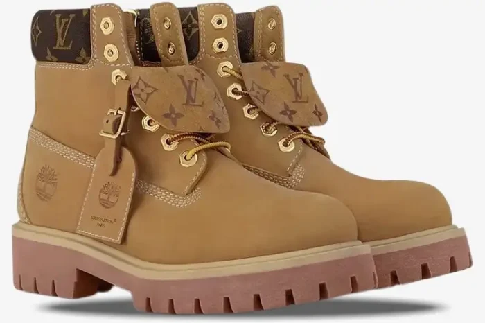 Louis Vuitton x Timberland 6-inch wheat ankle boots with monogram details, side view on white background. - SKU 1AD751