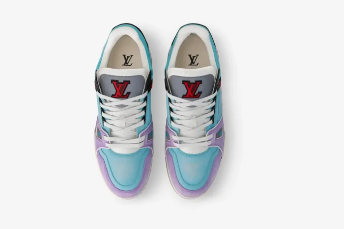 Top-down view of Louis Vuitton Trainer sneakers featuring a blue and purple gradient pastel colorway. - SKU 1AA6X0