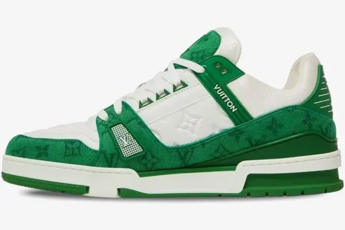 Side view of Louis Vuitton Trainer sneaker in green monogram denim and white leather. - SKU 1A9JHV-1A9JI1