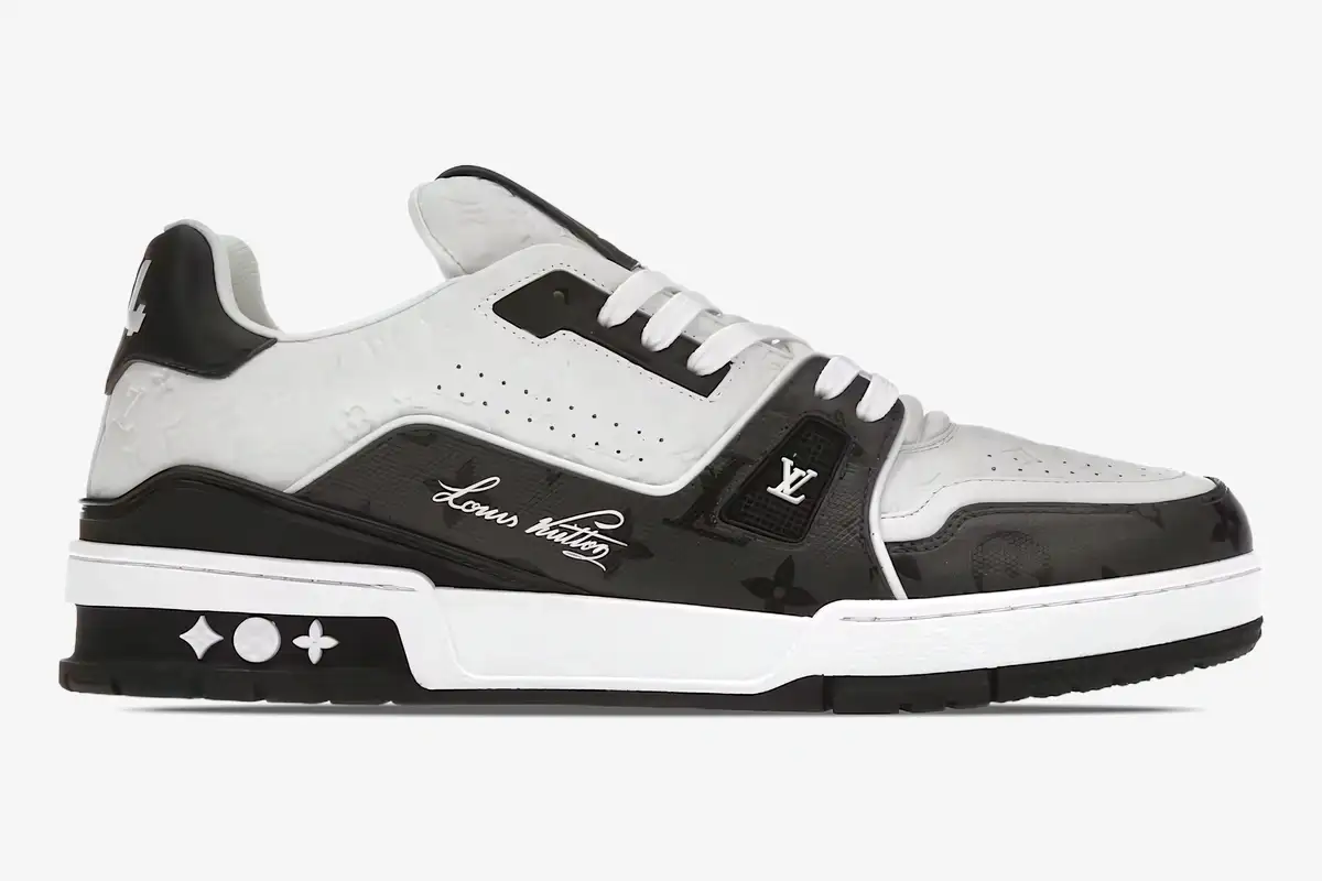 louis-vuitton-trainer-low-54-black-white-side-1a9ad4-790-663 Louis Vuitton Trainer Sneaker Low #54 in black and white, side profile view on a white background. - SKU 1A9AD4