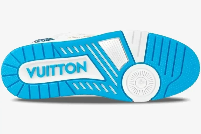 Bottom sole of a light blue and white Louis Vuitton Trainer Low sneaker, featuring VUITTON branding. - SKU 1A9J1N