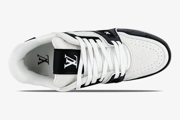 Top-down view of a Louis Vuitton Trainer Sneaker Low LV159 in white and black with white laces.