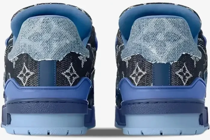Rear view of Louis Vuitton Trainer Monogram Denim Blue sneakers showing the heel and sole details. - SKU 1AC4YN