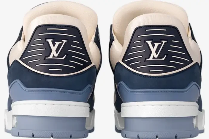 Rear view of Louis Vuitton Trainer sneakers in navy and beige mesh with LV heel logo. - SKU 1ABLUR