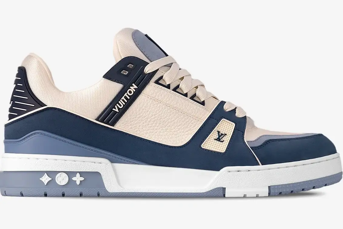 louis-vuitton-trainer-navy-beige-mesh-side-view-1ablur-903-398 Side profile of a Louis Vuitton Trainer sneaker in navy blue and beige mesh and leather. - SKU 1ABLUR
