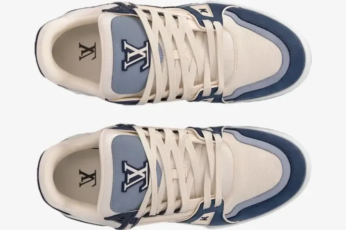 Top-down view of Louis Vuitton Trainer sneakers in navy beige mesh with cream laces and LV branding. - SKU 1ABLUR