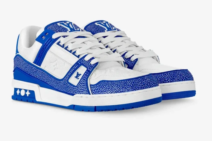 Blue and white Louis Vuitton Trainer Swarovski Limited Edition sneakers in a front three-quarter view. - SKU 1A813P-1A9VOA