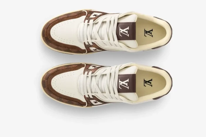 Top-down view of Louis Vuitton Trainer sneakers in white and moka brown leather. - SKU 1ACV5P