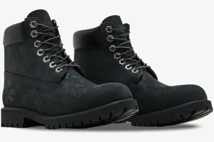 Louis Vuitton x Timberland black monogram 6-inch ankle boots shown from a side three-quarter angle. - SKU 1AD73H
