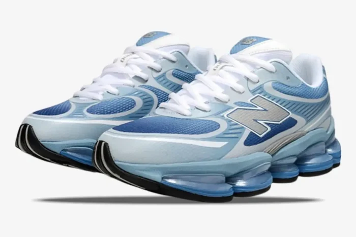 New Balance 2000 sneakers in Still Water and Blue Agate, three-quarter view showing mesh and chunky soles. - SKU U2000PBB