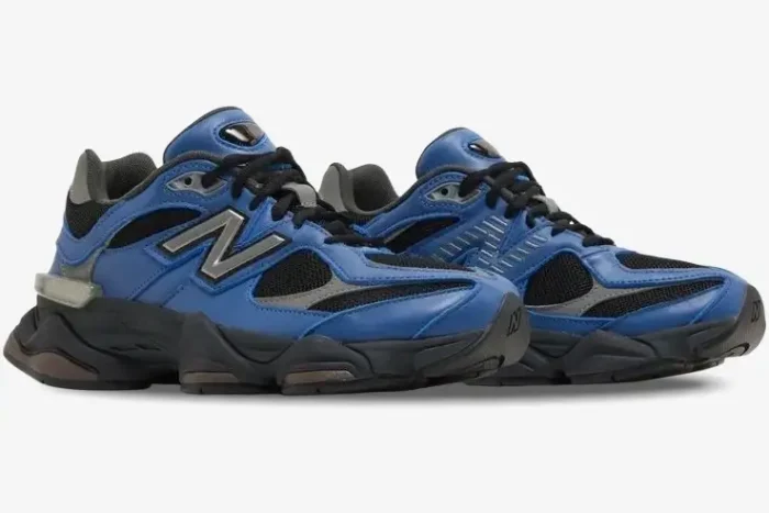 New Balance 9060 Dark Royal Brown sneakers in a side profile view with blue overlays and black mesh. - SKU U9060NRH