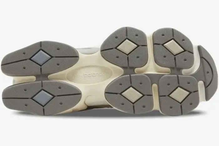 Bottom view of New Balance 9060 Mushroom sneakers showing the unique chunky grey and cream outsole pattern. - SKU U9060MUS