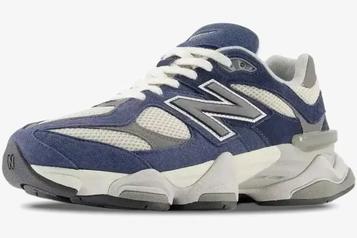 New Balance 9060 Natural Indigo sneakers in a low-angle three-quarter side view. - SKU U9060IND