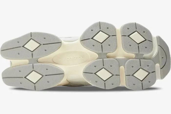 Outsole view of New Balance 9060 Quartz Grey sneakers featuring a unique pod-like tread pattern. - SKU U9060HSA