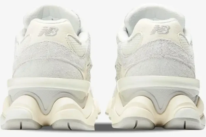 Rear view of New Balance 9060 Quartz Grey sneakers showing the chunky sculpted heel and embroidered logo. - SKU U9060HSA