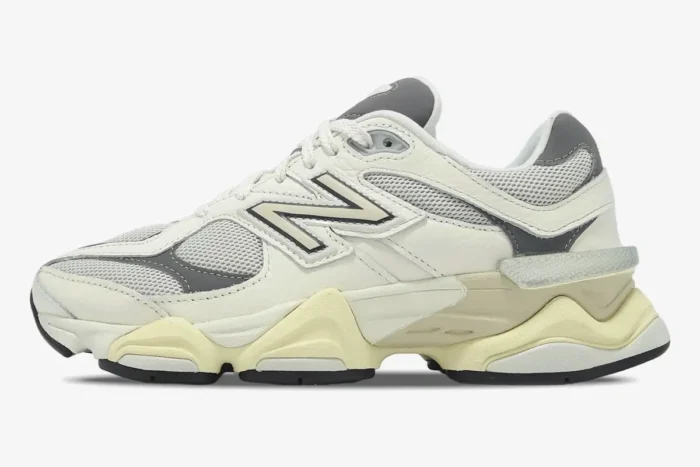 New Balance 9060 sneakers in white, grey, and beige, shown from a side profile view. - SKU U9060AGAD