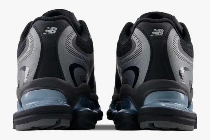 Rear view of New Balance Abzorb 2000 sneakers in black and silver metallic. - SKU U2000EA