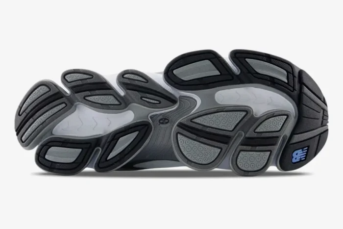 Bottom view of the New Balance Abzorb 2000 Grey sneaker showing the intricate outsole pattern. - SKU U2000AA