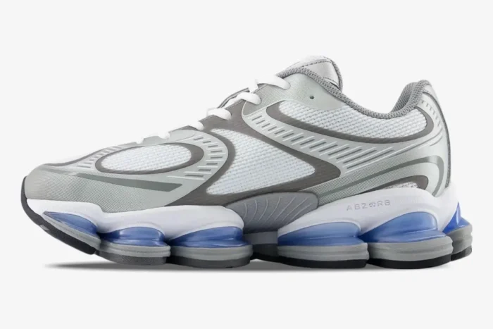 Side profile of a grey and white New Balance Abzorb 2000 sneaker with blue cushioning pods. - SKU U2000AA